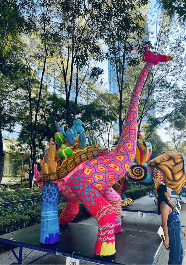 Vibrant Mexican Alebrije Art Large, colorful alebrije sculpture on display in Mexico City, traditional folk art during our cultural walking experiences.